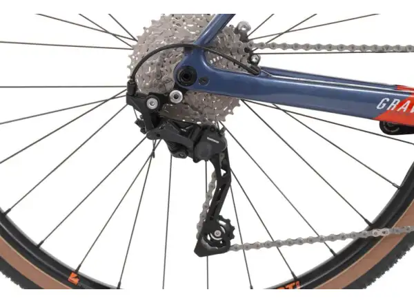 Rock Machine Gravelride CRB 700 Gravelbike in glänzendem Dunkelblau/Backsteinorange/Silber