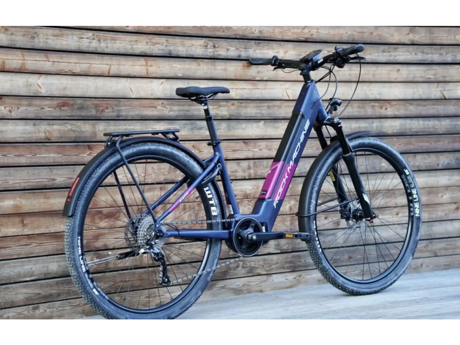 Rock Machine Storm INT e90-29 Damen-Touringrad in mattem Blau/Silber/Rosa Elektrofahrrad