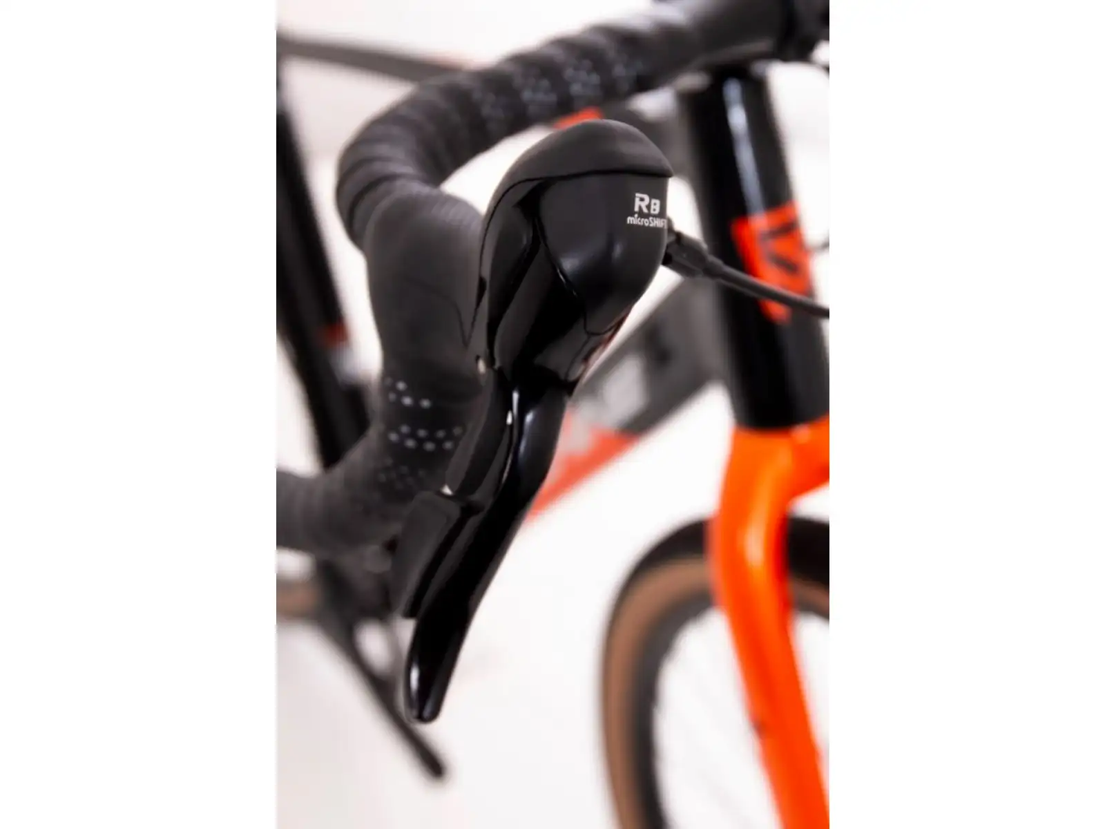 Rock Machine Gravelride 200 Schotterrad in Gloss Schwarz/Brick Orange/Silber.