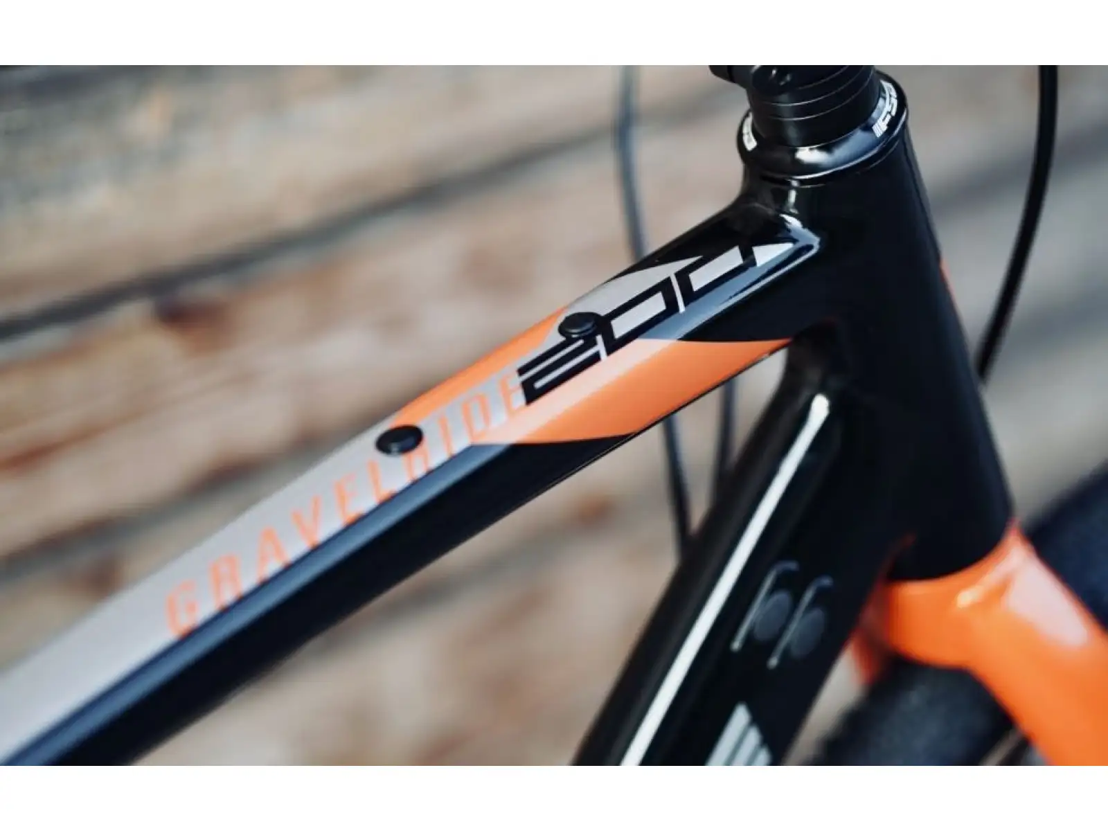 Rock Machine Gravelride 200 Schotterrad in Gloss Schwarz/Brick Orange/Silber.